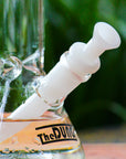 The Dung white half bowl cone piece in a The Dung chronical bong