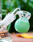 the dung 14mm aqua mini perc ash catcher in a chronical bong in a garden