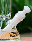 The Dung white half bowl cone piece in a The Dung chronical bong in a garden