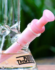 The Dung milky pink cone piece in a The Dung chronical bong in a garden
