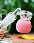 the dung 14mm milky pink mini perc ash catcher in a chronical bong in a garden